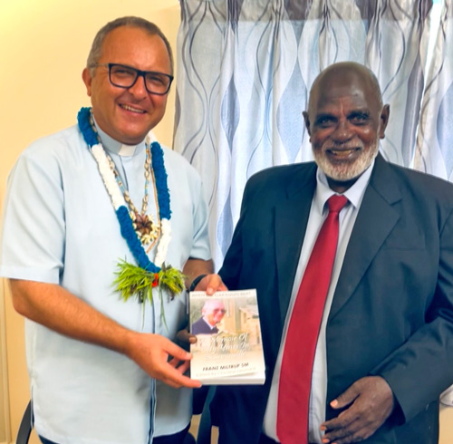 0323 Miltrup book launch 3 Bishop of Bougainville with Simon Pentanu